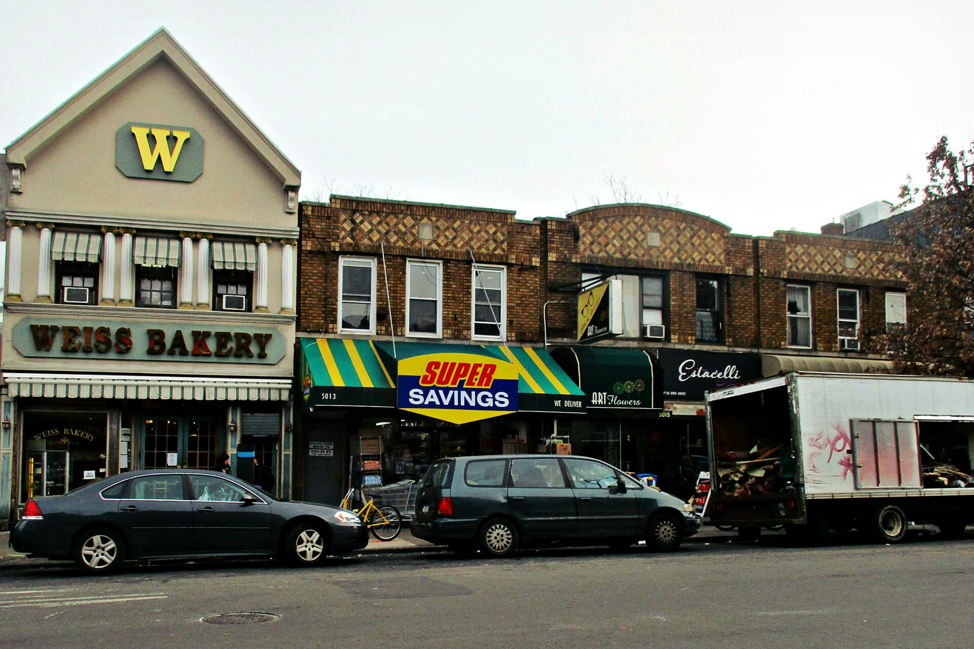 Kosher bakery and shop storefronts on 13th Avenue in Boro Park, Brooklyn