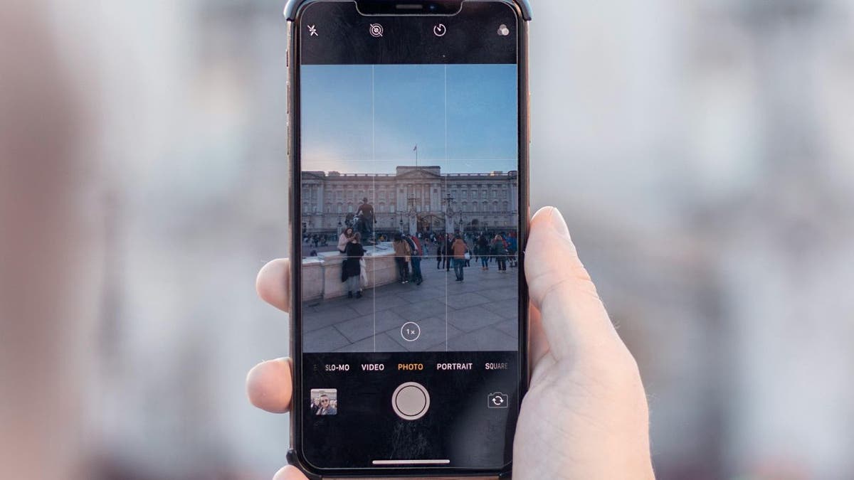 Taking a photo on an iPhone.