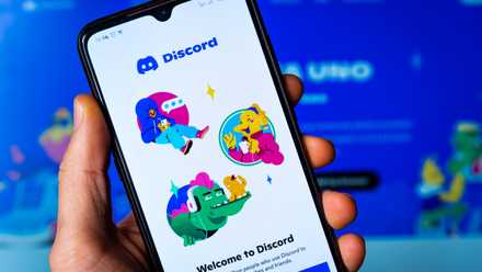 In this photo, the Discord social media app seen displayed on a smartphone.