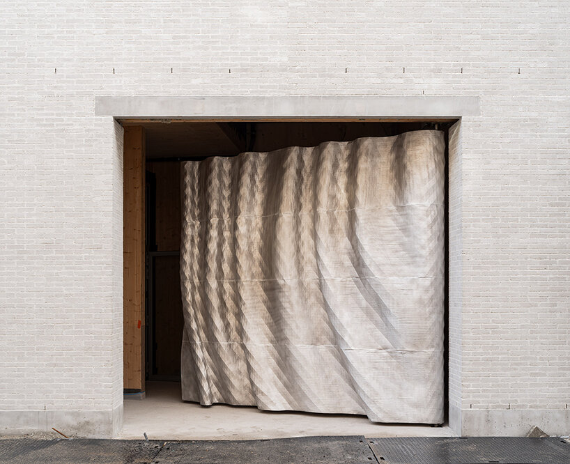 design museum gent reopens with new wing built from locally made waste bricks - 7