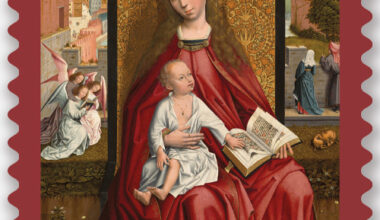 A stamp showing a painting of the Virgin Mary wearing red and holding the Christ child in her lap