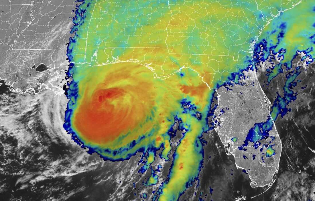 A satellite image shows Hurricane Isaias as it approaches the Gulf Coast around 2 p.m. ET Friday. The color image combines visual and infrared temperature data.