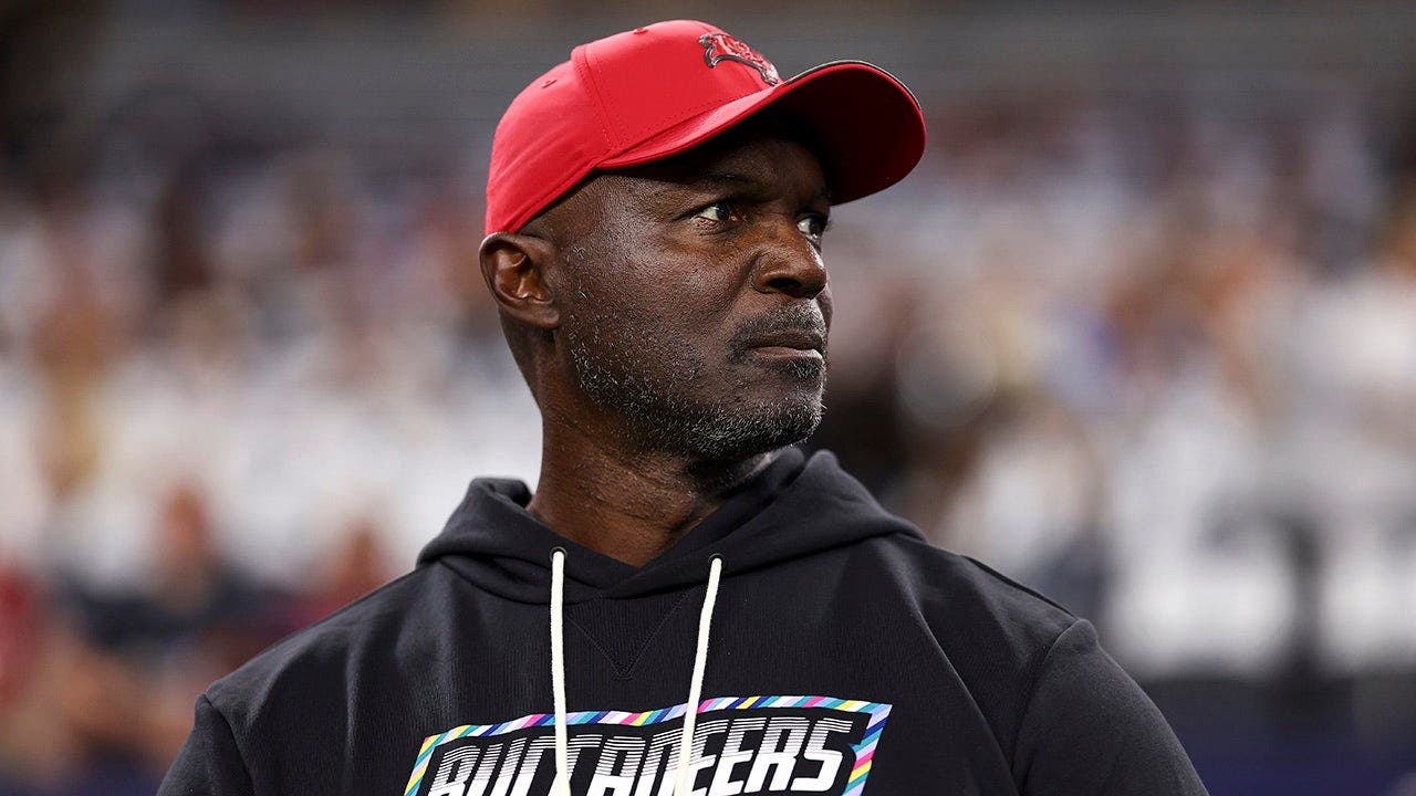 Buccaneers coach Todd Bowles suffers health scare after taking helmet to the stomach during celebration