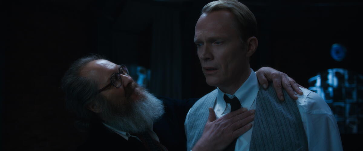 James Spader as Ultron patting Paul Bettany as Vision on the shoulder