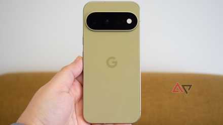 Google Pixel 11 in hand, pistachio color
