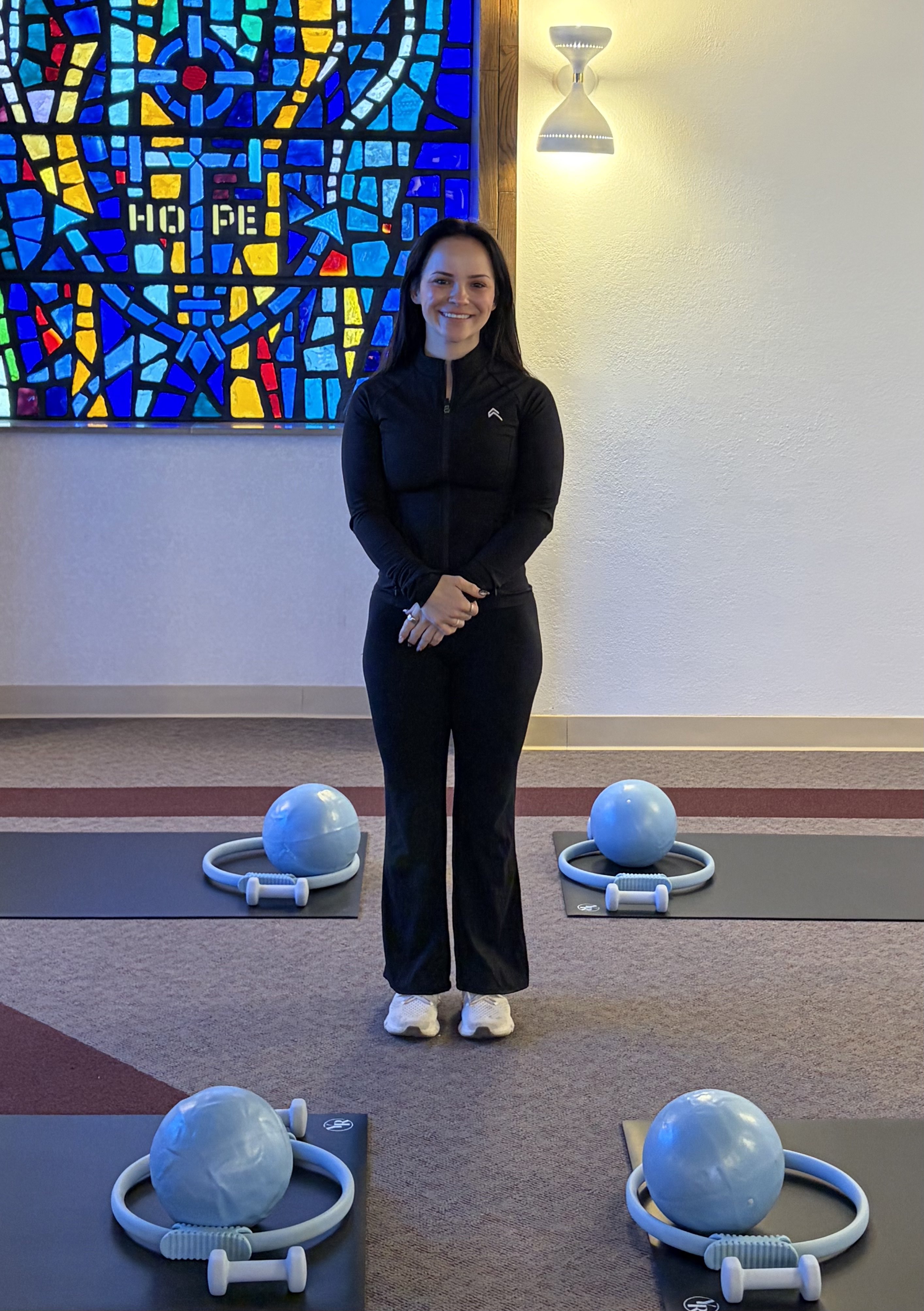 Isabelle Braun, Balanced Body Mat pilates instructor, poses for a picture inside her brand new pilates studio called Pilates & Strength Studio by Isabelle. Photo by Alin Hett/Hays Post