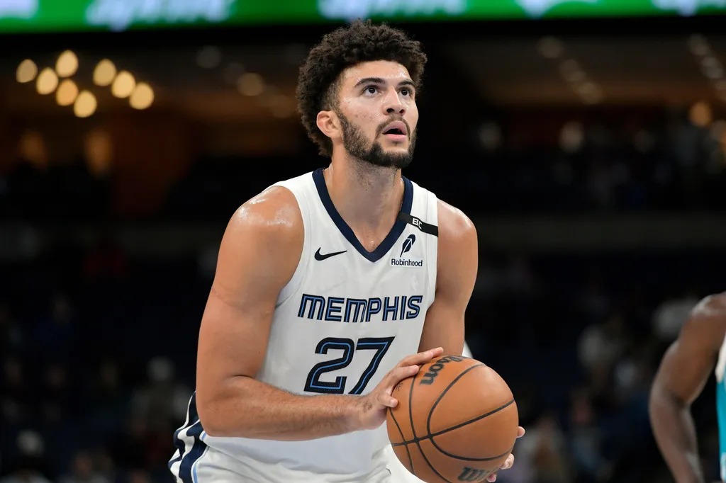 Memphis Grizzlies forward Cameron Boozer (27) plays in the second half of a preseason NBA basketball game against the Charlotte Hornets Friday, Oct. 16, 2026, in Memphis, Tenn. (AP Photo/Brandon Dill)