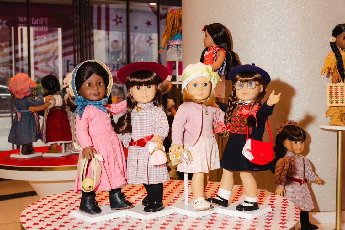 American Girl dolls of all historical eras are on display at the American Girl store in New York City.