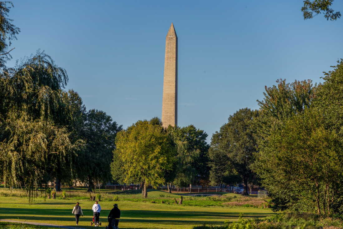 Golfers play East Potomac Golf Links on Sunday in Washington, D.C. President Trump has said his proposed redevelopment of the course will begin immediately. Administration lawyers contradicted him at Monday's hearing, saying there is no final plan.