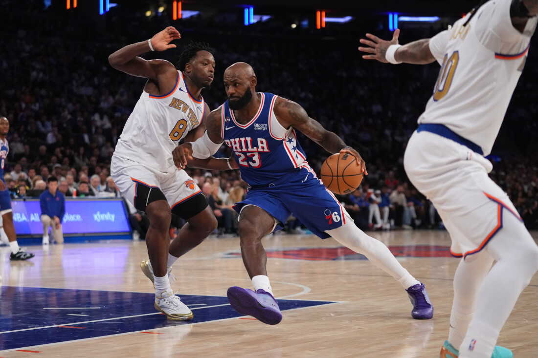 Philadelphia 76ers forward LeBron James (23) drives against New York Knicks forward Og Anunoby during the second half of an NBA basketball game Tuesday, Oct. 20, 2026, in New York.