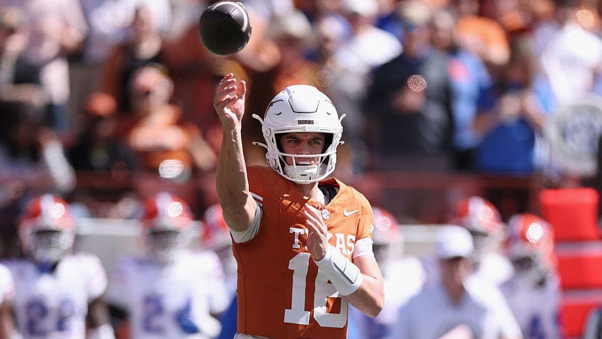 Arch Manning throws a pass during Texas Longhorns football game.