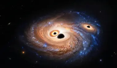 Three giant black holes discovered in a galaxy from the dawn of time