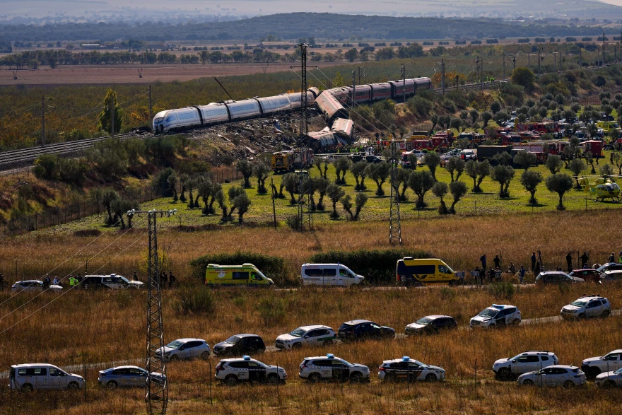 Emergency services work at the scene of a collision between two trains in Urda, Spain, on Wednesday, Oct. 28, 2026.