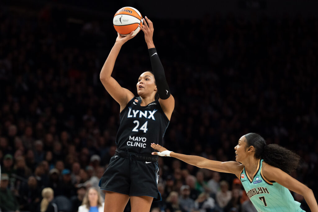 Minnesota Lynx forward Napheesa Collier (24) shoots the ball past New York Liberty guard Rebekah Gardner (7) in the first half during game one of the first round for the 2026 WNBA Playoffs at Target Center.
