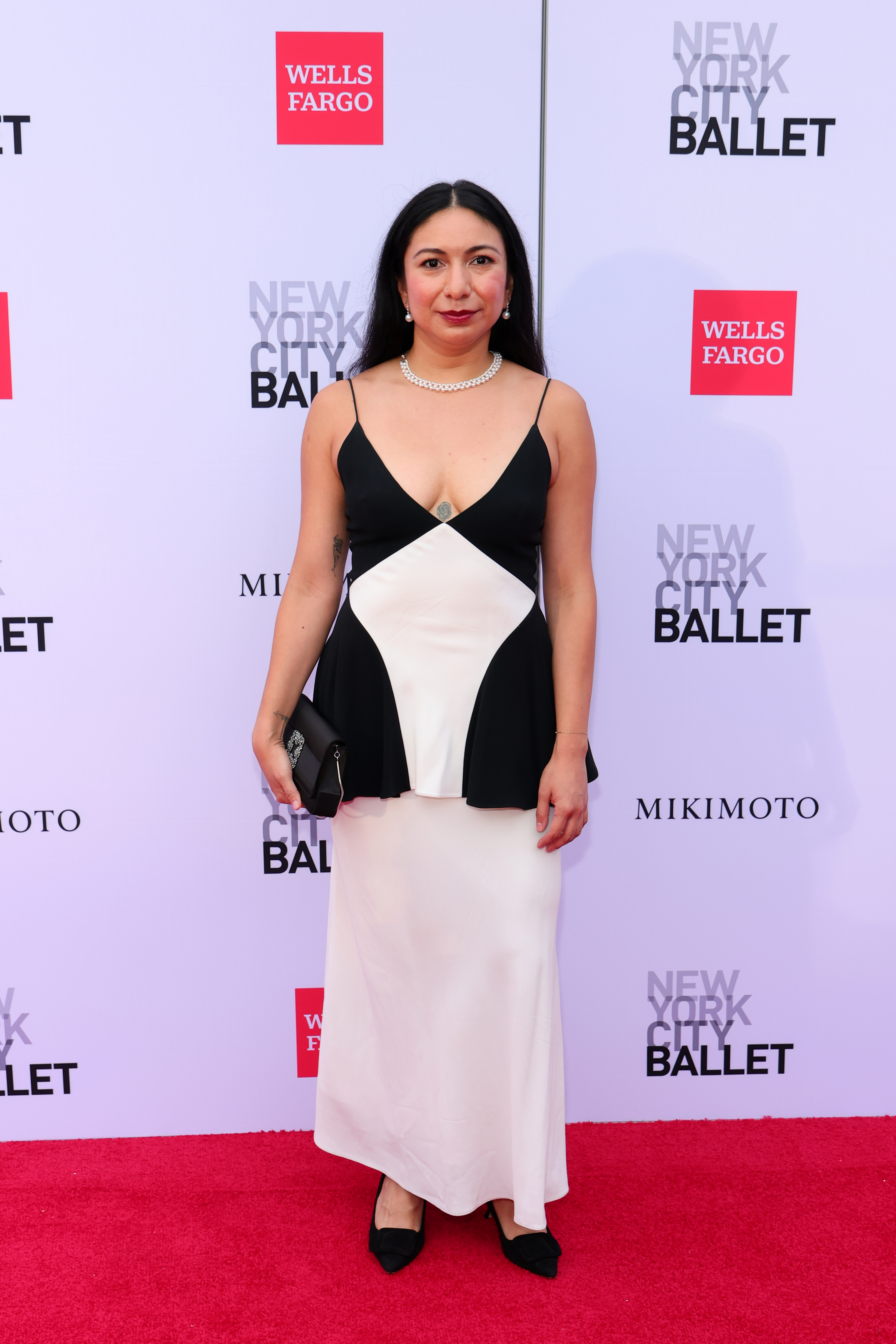 Jenna Adrian-Diaz poses on the red carpet at the New York City Ballet Fall Fashion Gala.
