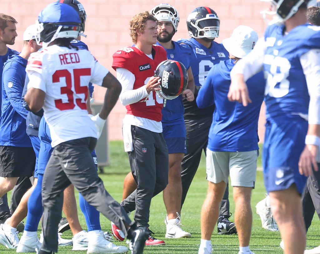 New York Giants quarterback J.J. McCarthy (18) practices at the Quest Diagnostics Training Center.