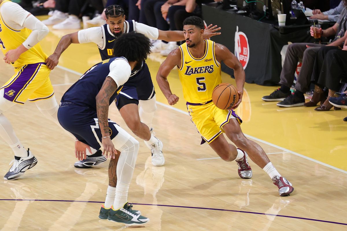 Los Angeles Lakers G Quentin Grimes (5) dribbles the basketball during an NBA basketball game against the Denver Nuggets, Friday October 16, 2026 in Los Angeles, Calif. Los Angeles Lakers G Quentin Grimes (5) dribbles the basketball during an NBA basketball game against the Denver Nuggets, Friday October 16, 2026 in Los Angeles, Calif.