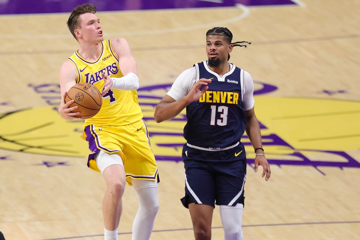 Los Angeles Lakers G Dalton Knecht (4) drives the lane during an NBA basketball game against the Denver Nuggets, Friday October 16, 2026 in Los Angeles, Calif. Los Angeles Lakers G Dalton Knecht (4) drives the lane during an NBA basketball game against the Denver Nuggets, Friday October 16, 2026 in Los Angeles, Calif.