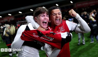 Fleetwood's players celebrate after beating Premier League champions Arsenal in the League Cup fourth round