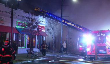 Crews battle a 5-alarm fire at a Somerville building