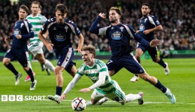 Callum Osmand of Celtic goes down under a Celta Vigo challenge