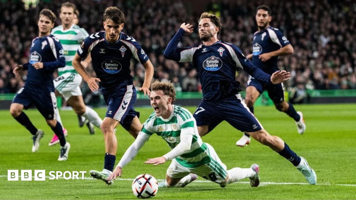 Callum Osmand of Celtic goes down under a Celta Vigo challenge