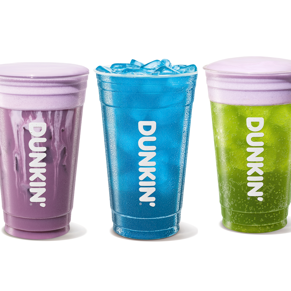 Three colorful drinks in Dunkin' cups: purple, blue with ice, and green. Three colorful drinks in Dunkin' cups: purple, blue with ice, and green.