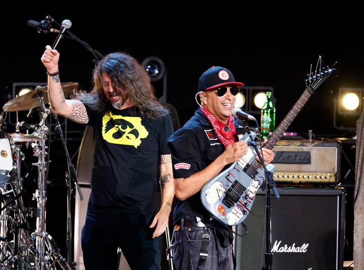 David Grohl (left) of the Foo Fighters performs with Rage Against the Machine’s Tom Morello wearing an Iowa Hawkeyes shirt during the 2026 Power To The People Festival on Saturday.