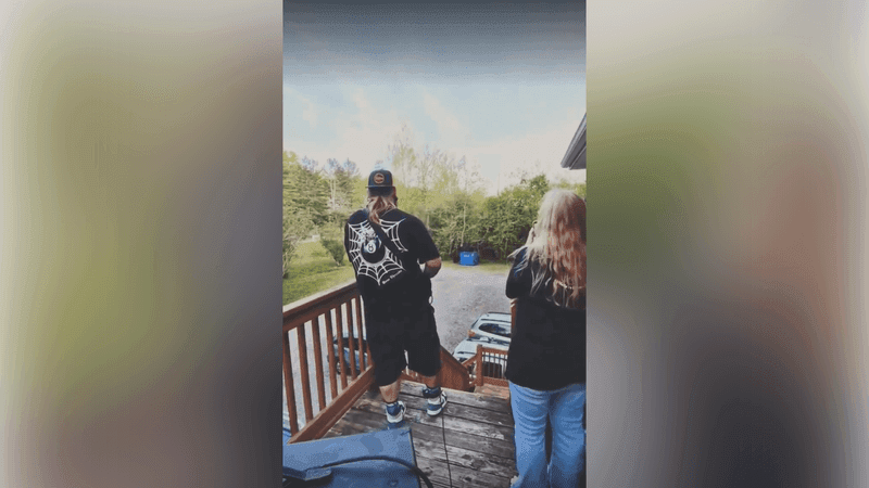 APRIL 2026 - A still image of a video showing an attempt to deter black bears by playing an electric guitar in western North Carolina. (Credit: Andy M. Phail)