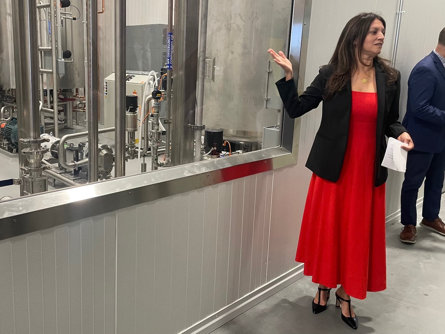 Navyn Salem, founder and CEO of Edesia Nutrition, leads a tour of the factory in North Kingstown, R.I., on Oct. 22, 2026.