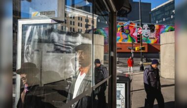 A woman laughs behind glass, rainbows arc through a sprinkler and a marching band waits by the sea: Alex Webb’s camera photographs an America that's busy, bright and connected