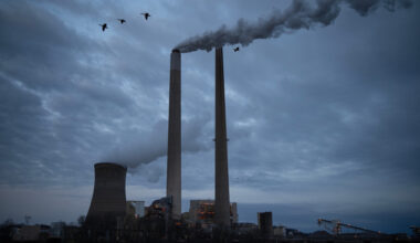 FILE - The coal-fired Mountaineer Power Plant, near New Haven, W.Va., operates across the Ohio River from the Lock 24 RV Park and Campground in Racine, Ohio, March 13, 2026. (AP Photo/Carolyn Kaster, File)