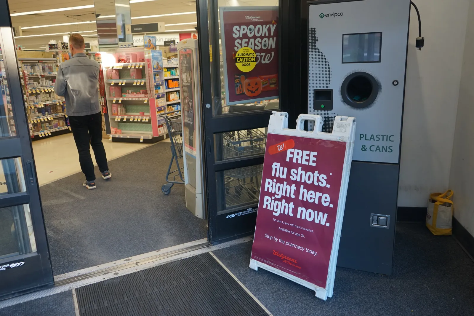 A flu shot sign is seen at a Walgreens in Brooklyn, N.Y., Tuesday, Oct. 20, 2026. (AP Photo/Julia Weeks)