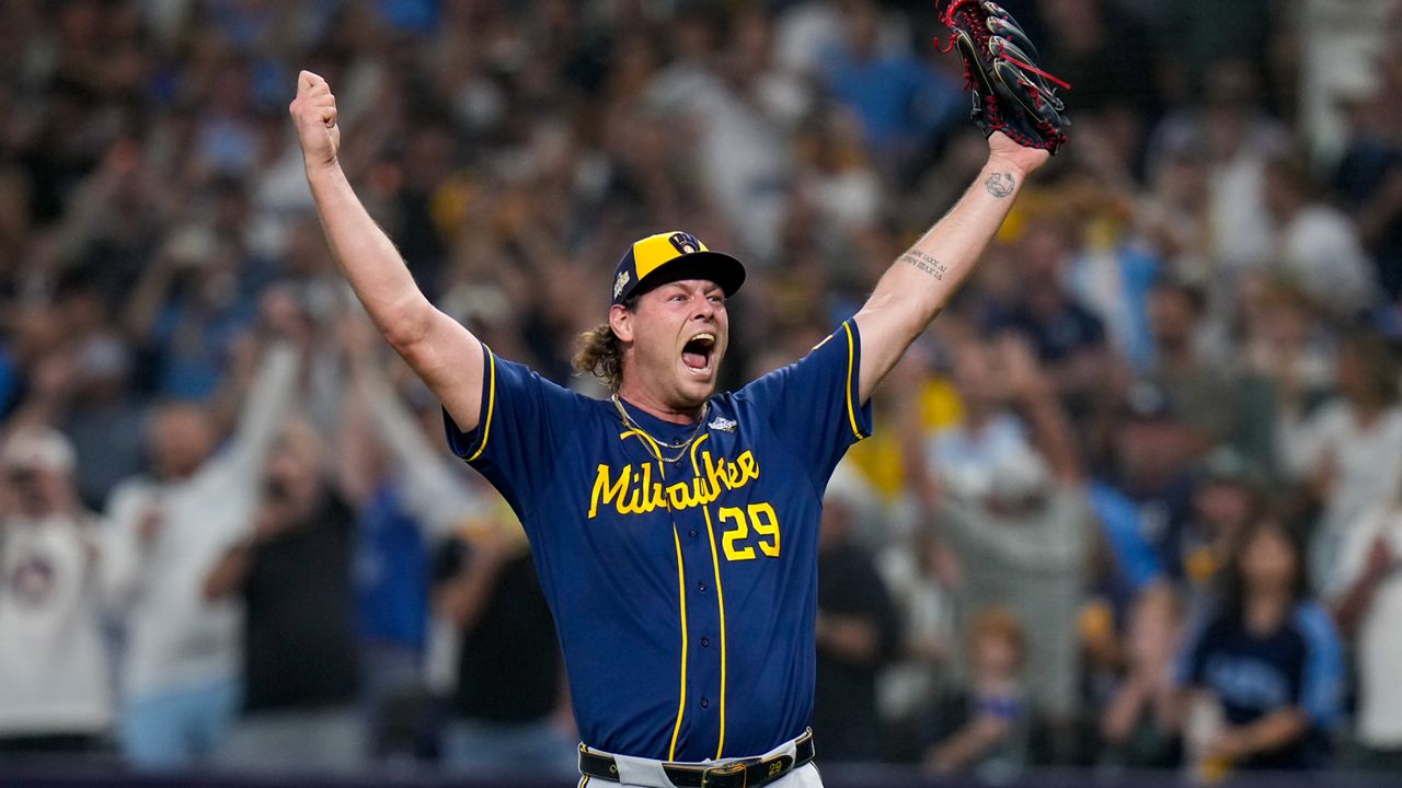 Milwaukee Brewers pitcher Trevor Megill celebrates after winning baseball's World Series, against the Tampa Bay Rays, Wednesday, Oct. 28, 2026, in St. Petersburg, Fla.