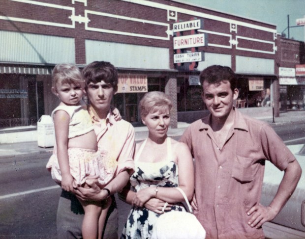 George Harrison, at 20, with his sister Louise and brother Peter, with one of Louise's children, in Benton, Illinois, in 1963. George vacationed in southern Illinois a few months before the Beatles became famous in this country. Louise was married to a miner who worked in nearby West Frankfort. (Acclaim Press)
