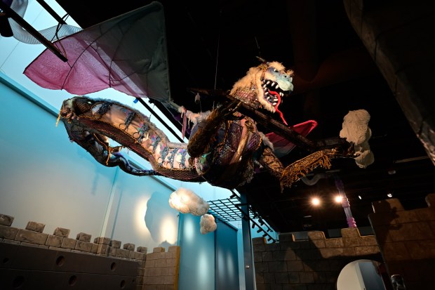 A dragon sculpture is seen above the Dragon Sky Castle exhibit in the new permanent, hands-on children's exhibit area, DreamLab, at the Longmont Museum on Tuesday. People can see DreamLab for free on Saturday during the museum's grand reopening celebration. (Matthew Jonas/Staff Photographer)