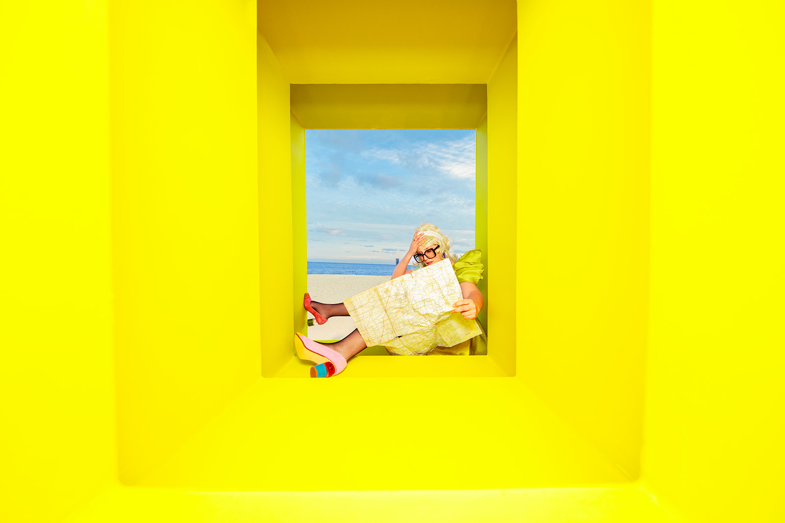 A photo from Jada and David that mixes a warped wormhole set with Cape Cod as the background