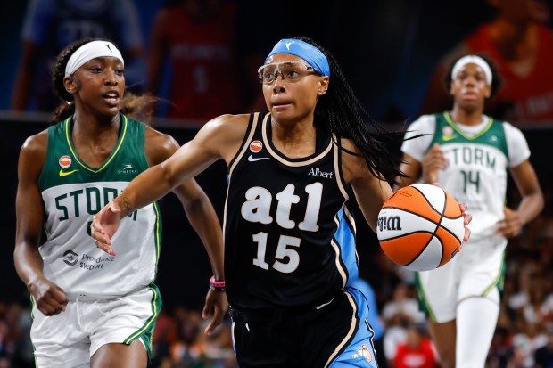 Allisha Gray of the Atlanta Dream drives to the basket against Flau'jae Johnson of the Seattle Storm during the third quarter at Gateway Center Arena on July 9, 2026 in College Park, Georgia. (Photo by Todd Kirkland/Getty Images)
