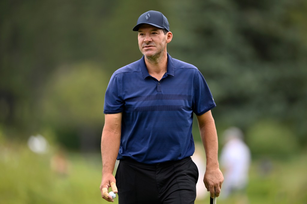 Tony Romo walking on the golf course during the American Century Championship.