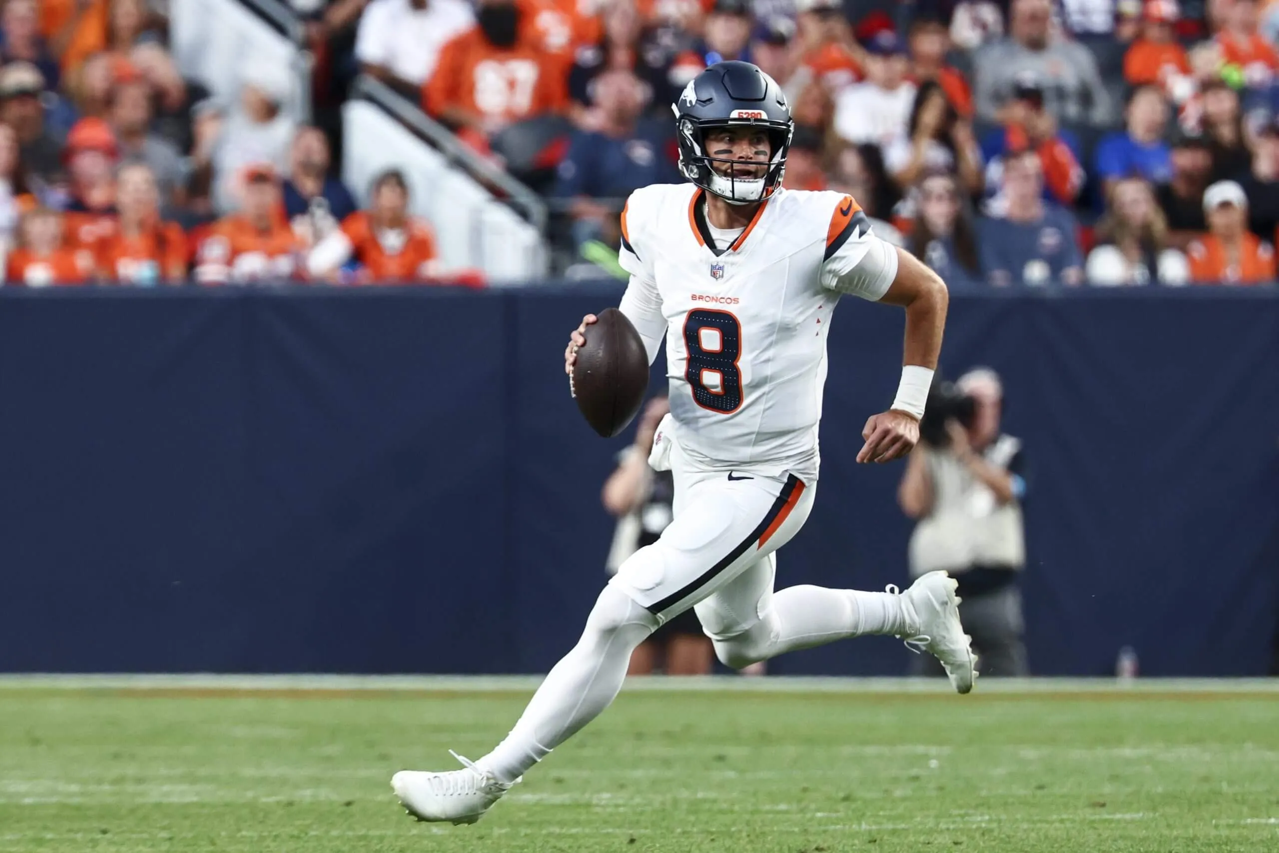 Jarrett Stidham #8 of the Denver Broncos looks to pass against the Minnesota Vikings