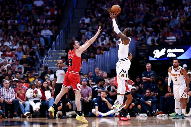 DeMar DeRozan #10 of the Denver Nuggets takes a shot against Josh Giddey #3 of the Chicago Bulls during the first quarter in a preseason game at Ball Arena on October 11, 2026 in Denver, Colorado. (Photo by Tyler McFarland/Getty Images)