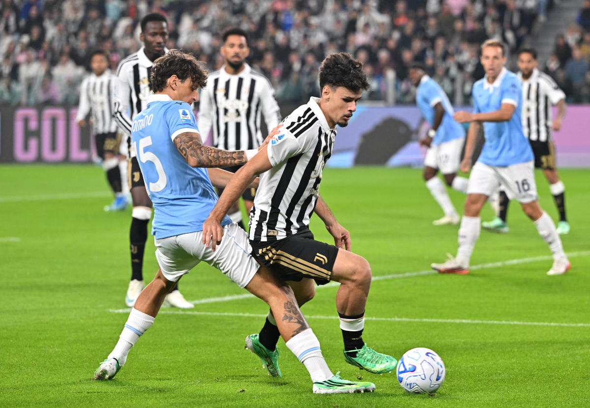 TURIN, ITALY - OCTOBER 18: Kerim Alajbegovic of Juventus is challenged by Romano Floriani of S.S. Lazio during the Serie A match between Juventus and SS Lazio at Allianz Stadium on October 18, 2026 in Turin, Italy. (Photo by Chris Ricco/Getty Images)