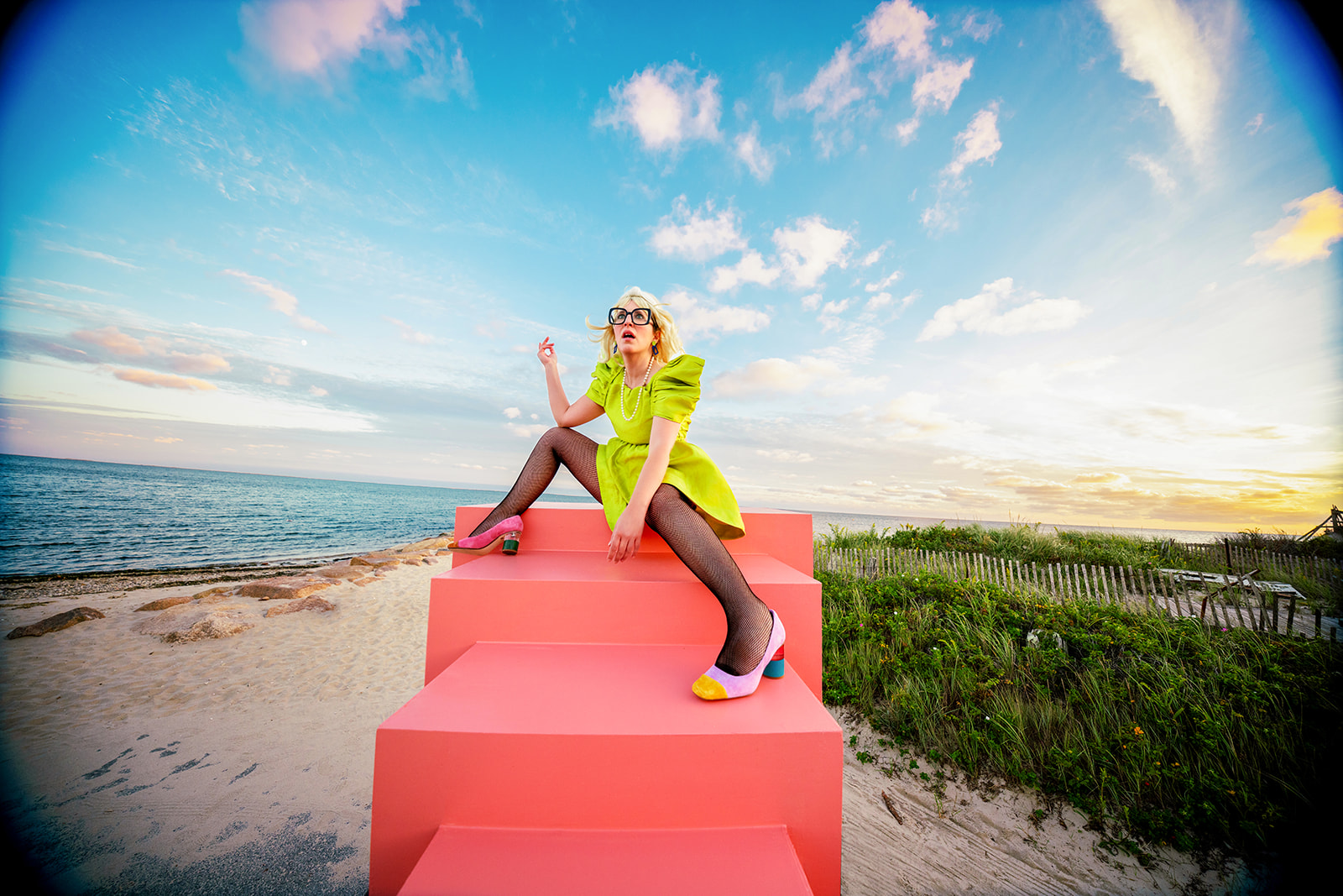 A photo from Jada and David that mixes a warped wormhole set with Cape Cod as the background
