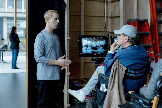 THE SOCIAL RECKONING, from left: Jeremy Strong, director Aaron Sorkin, on set, 2026. ph: Leah Gallo / © Columbia Pictures / courtesy Everett Collection