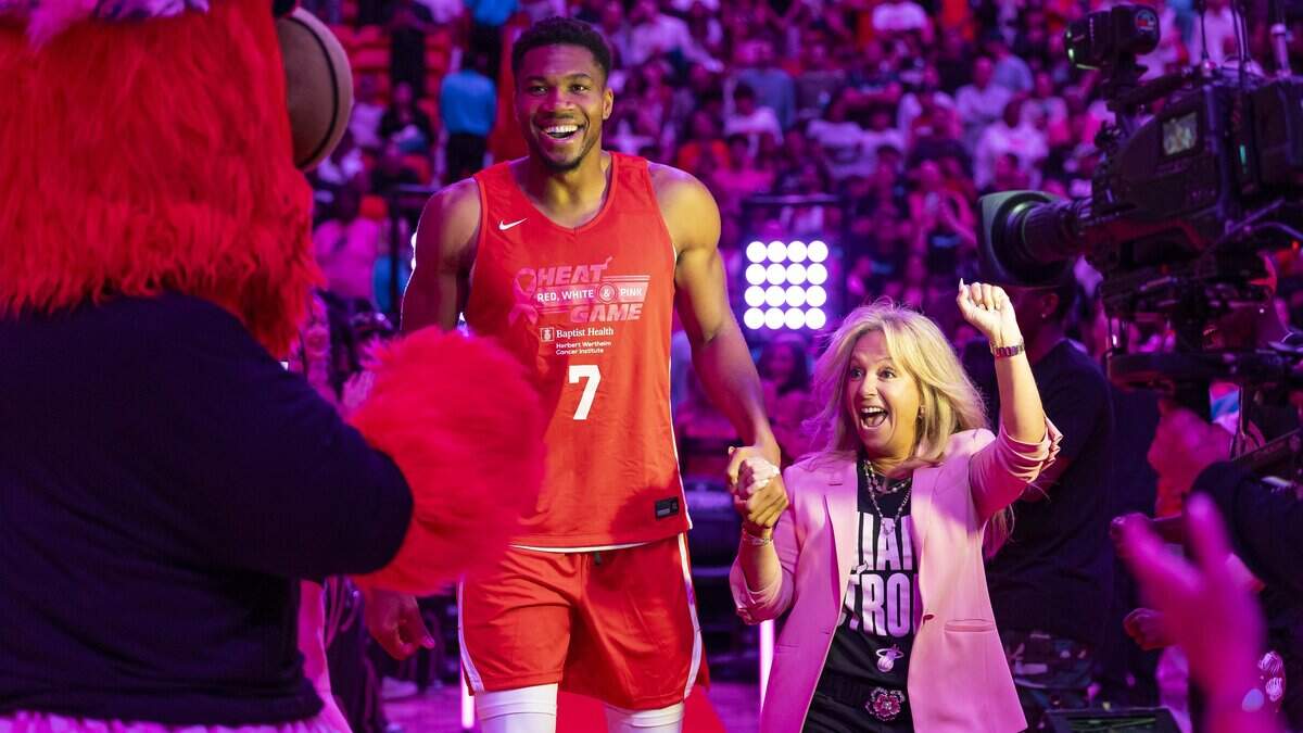 Miami Heat forward Giannis Antetokounmpo (7) reacts while participating in the Heat Red, White & Pink intrasquad scrimmage game at the Kaseya Center on Tuesday, Oct. 6, 2026, in downtown Miami, Fla.
