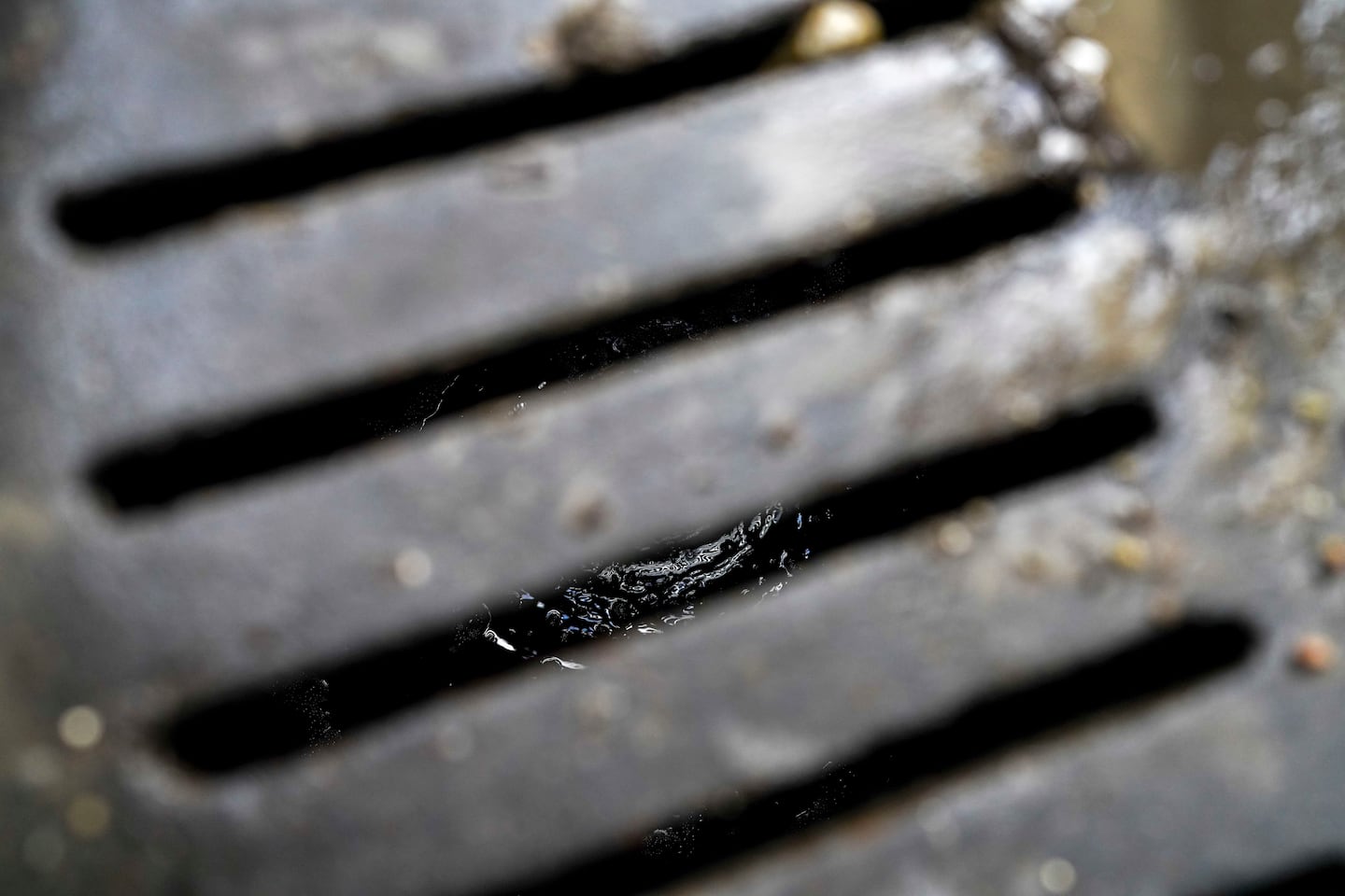 Water drained through a sewer grate after the city of Boston intervened.