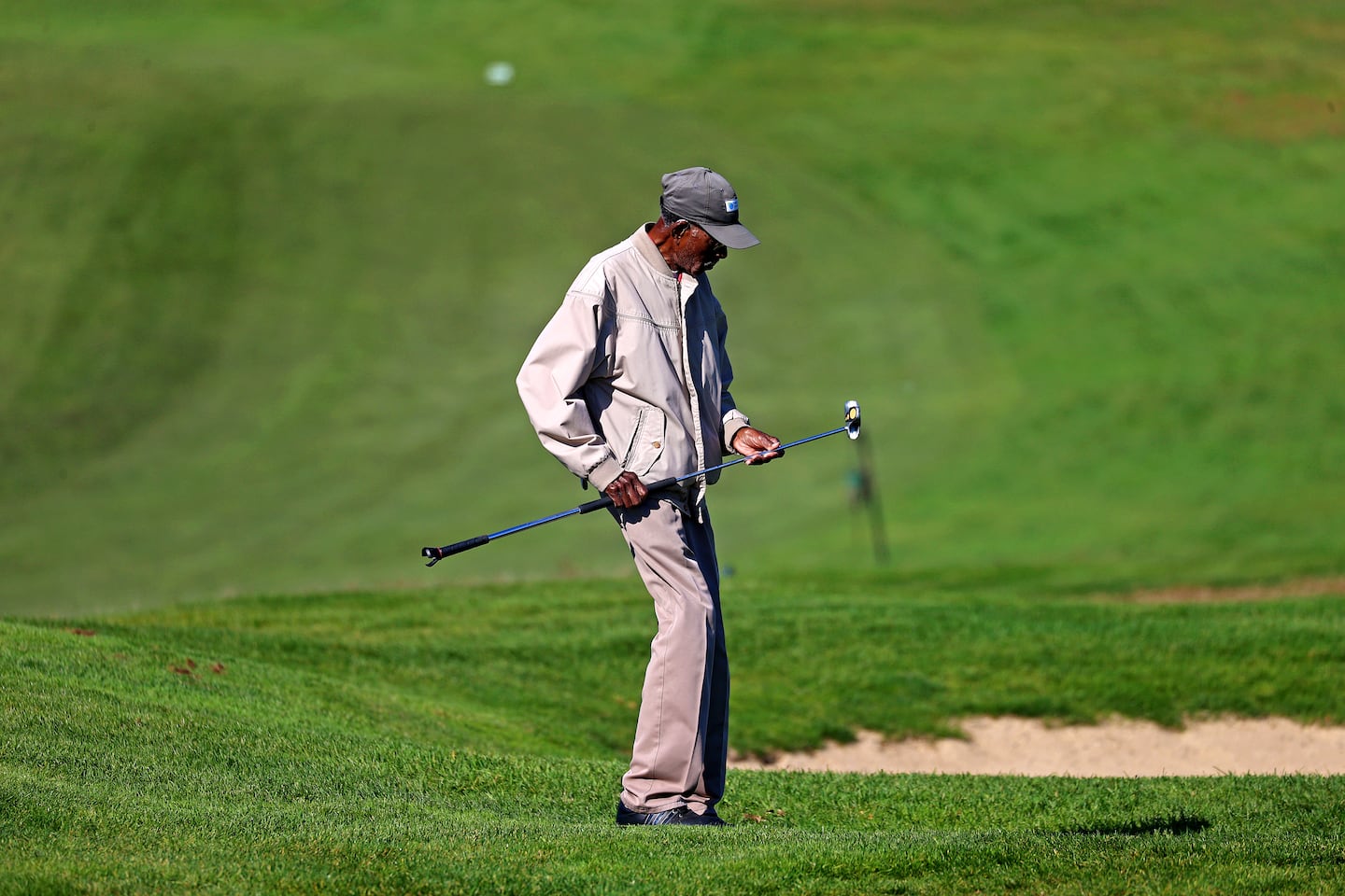 George Jones, 94, walks toward the green on Oct. 8, 2026. 