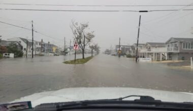 Image posted by the Surf City Police Department of flooded streets in the borough on Saturday.