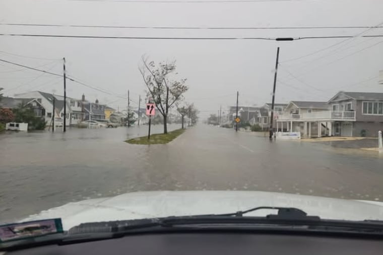 Image posted by the Surf City Police Department of flooded streets in the borough on Saturday.