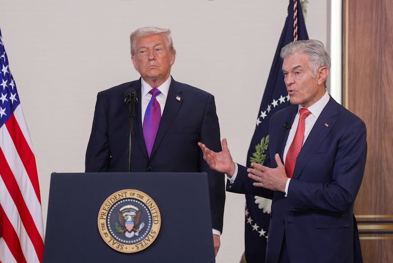 U.S. President Donald Trump listens as Dr. Mehmet Oz, Administrator for the Centers for Medicare and Medicaid Services, speaks during an event to unveil the TrumpRx drug discount site, in the South Court Auditorium on the White House campus, in Washington, D.C., U.S., February 5, 2026.